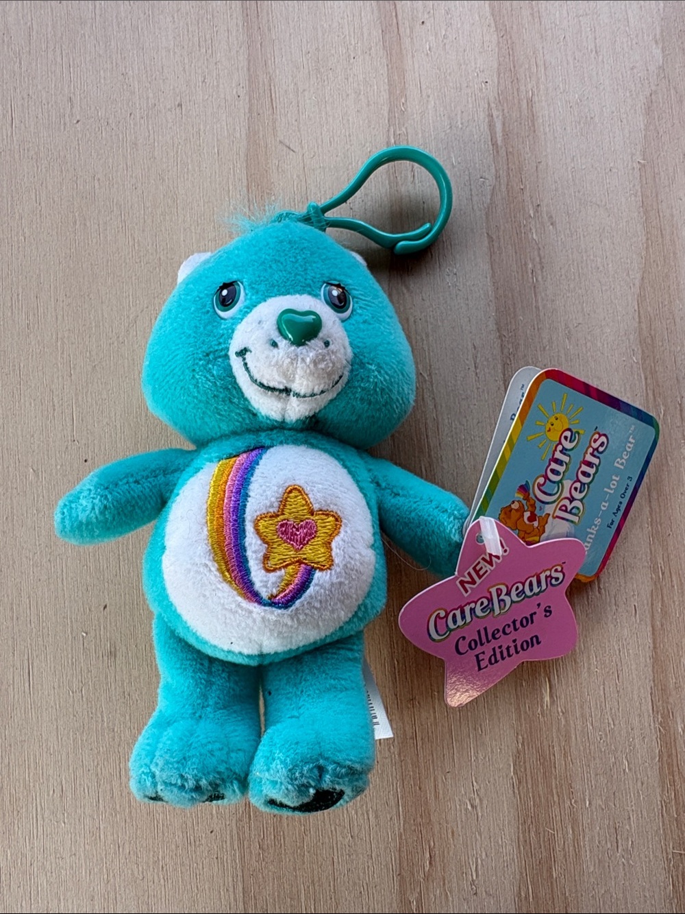 Care Bears Teal Plush Key Clip with Rainbow Star Belly Badge